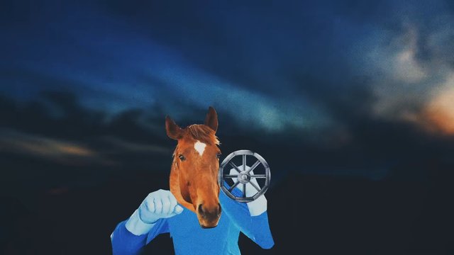 Video Reference: horse mask, costume, person, blue outfit, gloves, fantasy, surreal, dark sky, clouds, theatrical, wheel, mask, outdoors, unusual, performance, humor