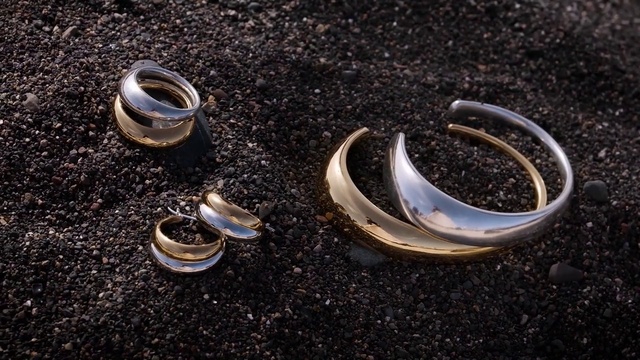 Video Reference: Body jewelry, Wood, Natural material, Headgear, Font, Eyewear, Jewellery, Metal, Wedding ceremony supply, Close-up