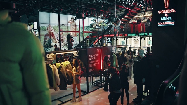 Video Reference: Outerwear, Standing, Crowd, Fun, City, Metropolitan area, Event, Urban area, Electricity, Display device