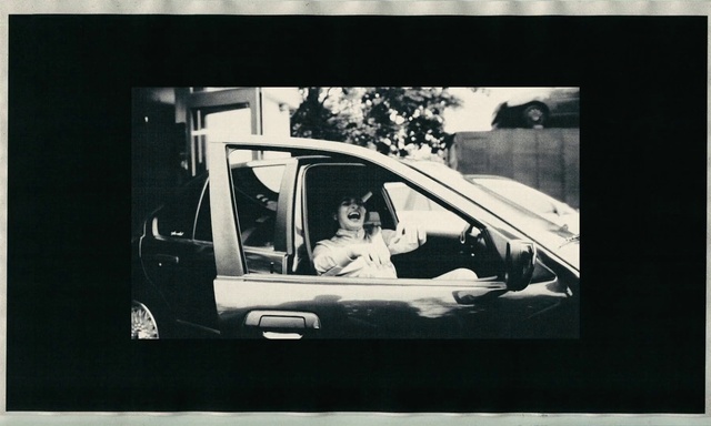 Video Reference: Vehicle, Car, Automotive side-view mirror, Hood, Automotive lighting, Automotive mirror, Motor vehicle, Automotive design, Flash photography, Gesture