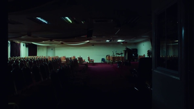 Video Reference: Entertainment, Chair, Performing arts, Hall, Event, Magenta, Darkness, Ceiling, Sky, Flooring