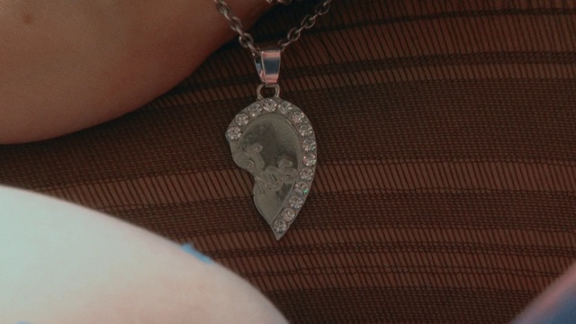 Video Reference: Body jewelry, Neck, Natural material, Wood, Finger, Necklace, Jewellery, Tree, Electric blue, Metal