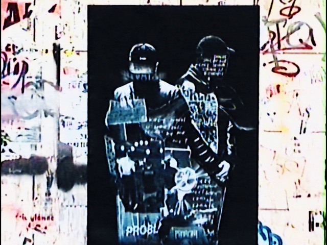 Video Reference: Sleeve, Font, Rectangle, Art, T-shirt, Poster, Pattern, Display device, Visual arts, Fictional character