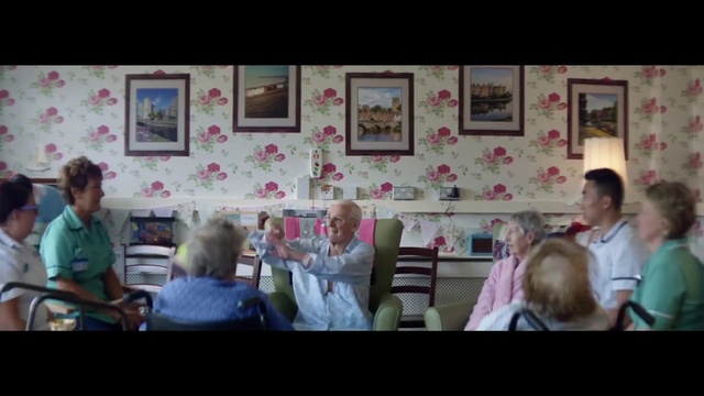 Video Reference: Clothing, Hairstyle, Shirt, Picture frame, Textile, T-shirt, Interaction, Art, Fun, Crowd