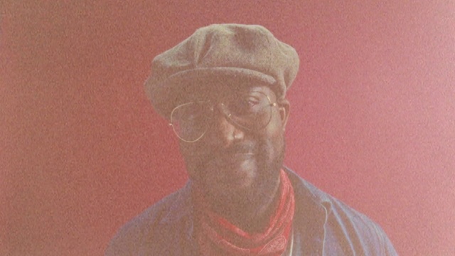 Video Reference: Glasses, Beard, Jaw, Sculpture, Art, Statue, Cap, Artifact, Facial hair, Tints and shades