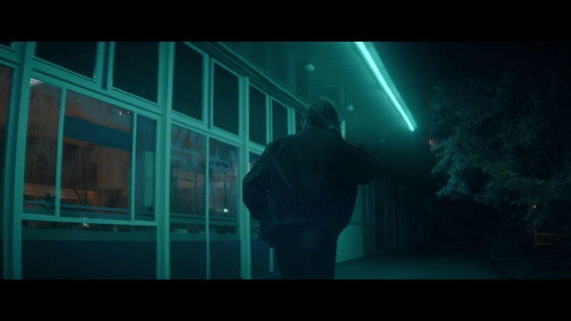 Video Reference: Window, Electric blue, Art, Darkness, Event, Fictional character, Midnight, Personal protective equipment, Font, Room