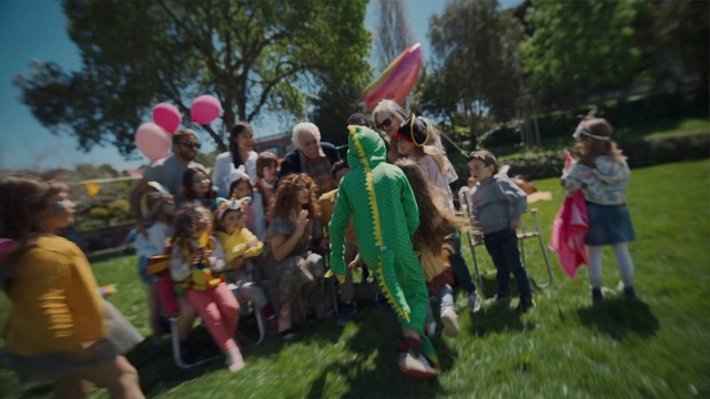 Video Reference: Shorts, Plant, Tree, Dress, Social group, Hat, Flag, Leisure, Fun, Crowd