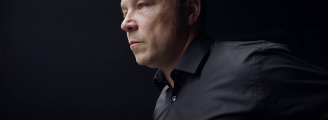 Video Reference: Nose, Cheek, Human body, Flash photography, Jaw, Ear, Sleeve, Gesture, Collar, Dress shirt