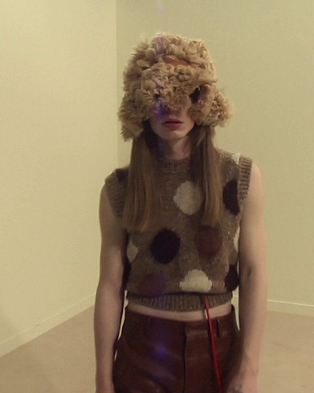 Video Reference: Sleeve, Waist, Hat, Fashion design, Fawn, Wig, Afro, Thigh, Necklace, Toy