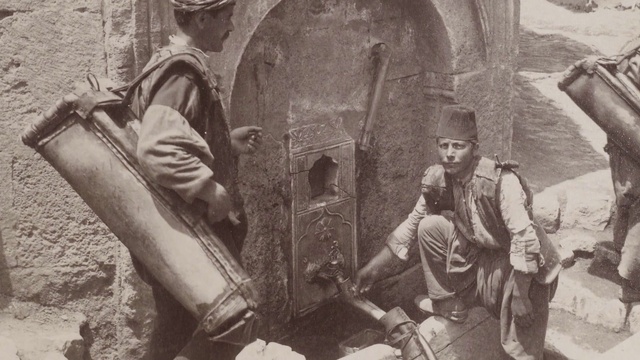 Video Reference: Motor vehicle, Automotive tire, Helmet, Headgear, Soldier, Art, Military organization, Monochrome, Personal protective equipment, Wood