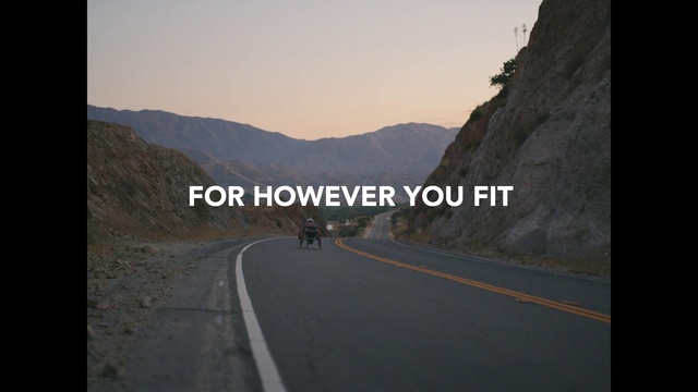 Video Reference: Sky, Mountain, Road surface, Asphalt, Highland, Motor vehicle, Natural landscape, Travel, Thoroughfare, Tar