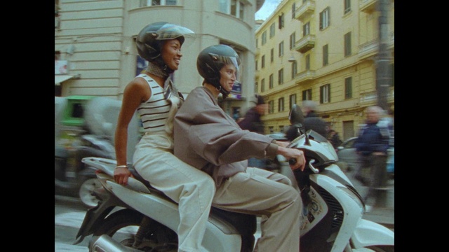 Video Reference: Trousers, Helmet, Leg, Window, Tire, Sunglasses, Wheel, Eyewear, Motor vehicle, Travel