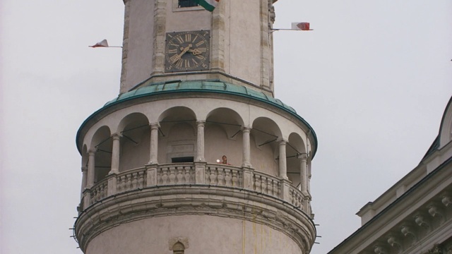 Video Reference: Sky, Tower, Building, Clock, Clock tower, Facade, City, Steeple, Finial, Turret