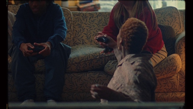 Video Reference: Mouth, Comfort, Adaptation, Couch, Fun, Hat, Electronic device, Event, Sitting, Darkness