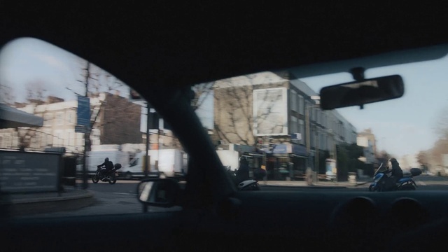 Video Reference: Automotive lighting, Building, Mirror, Automotive mirror, Window, Road surface, Asphalt, Rear-view mirror, Vehicle, Automotive exterior