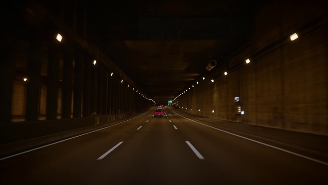 Video Reference: Brown, Automotive lighting, Car, Road surface, Asphalt, Electricity, Street light, Mode of transport, Thoroughfare, Headlamp