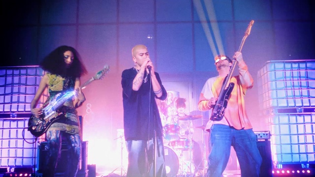 Video Reference: Microphone, Musical instrument, Musician, Public address system, Plant, Purple, Guitarist, Blue, Band plays, String instrument