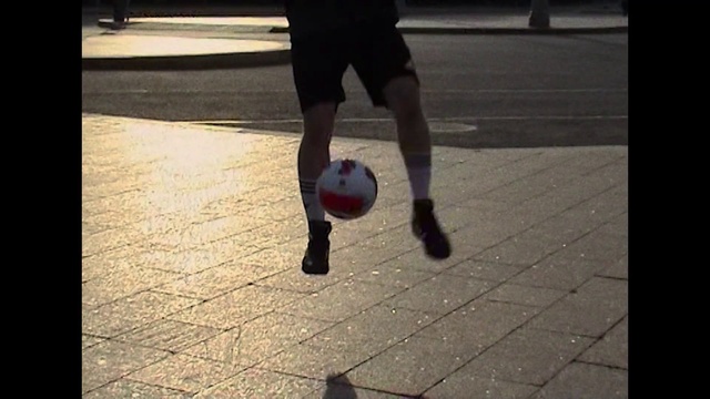 Video Reference: Shorts, Sports equipment, Football, Leg, Ball, Street football, Soccer, Soccer ball, Ball game, Player
