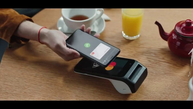 Video Reference: Hand, Tableware, Cup, Gesture, Drinkware, Communication Device, Finger, Table, Mobile phone, Serveware