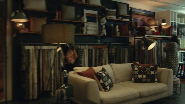 Video Reference: Brown, Property, Furniture, Interior design, Shelving, Couch, Wood, Wall, Beige, Floor