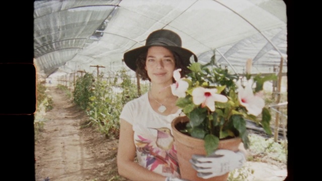 Video Reference: Plant, Flowerpot, Flower, Smile, Hat, Sun hat, Houseplant, Grass, Happy, Petal