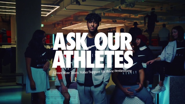 Video Reference: Font, Headgear, Leisure, Hat, Fashion design, Shorts, Event, Chair, Crowd, T-shirt