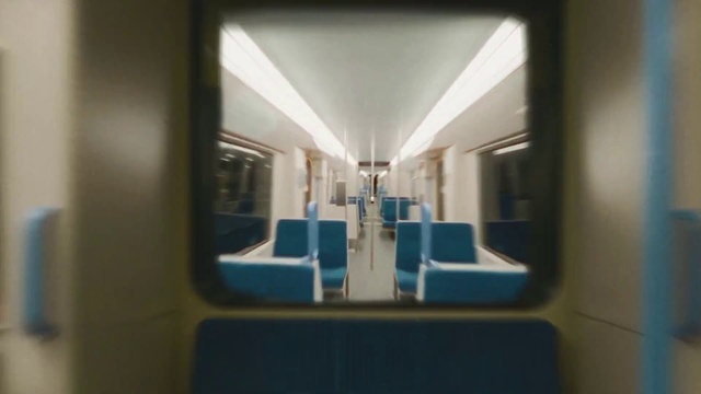 Video Reference: Train, Window, Fixture, Rolling stock, Vehicle, Building, Passenger car, Public transport, Tints and shades, Symmetry