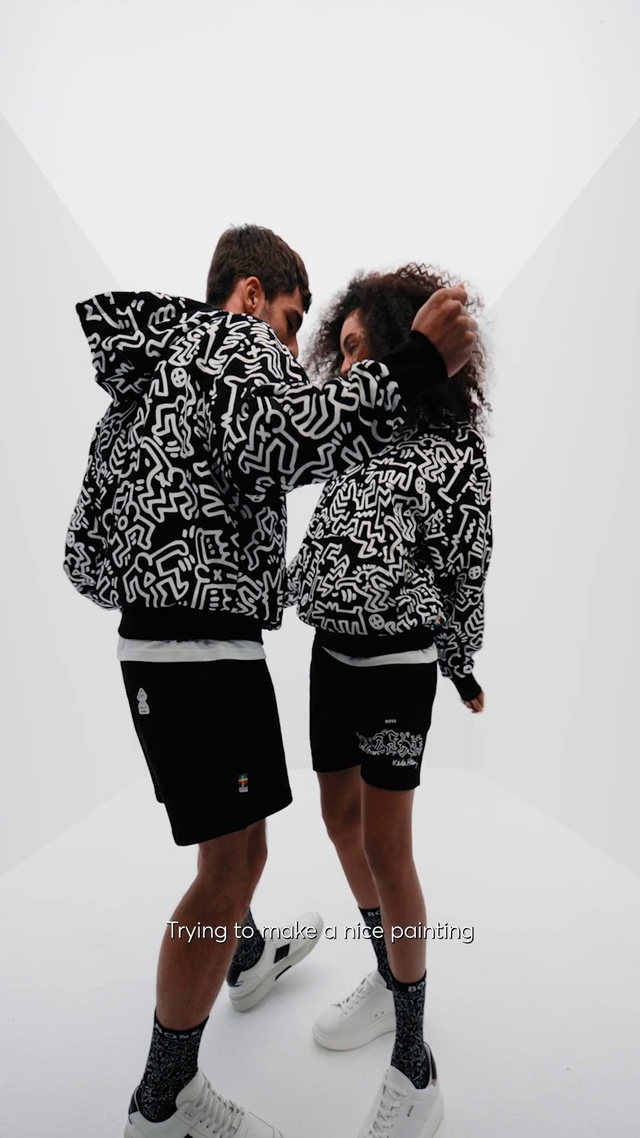 Video Reference: Shorts, Outerwear, Sleeve, Flash photography, Gesture, Knee, Waist, Thigh, Style, T-shirt