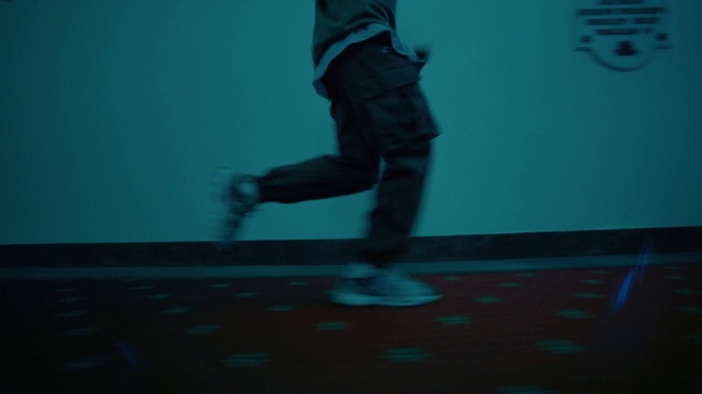Video Reference: Floor, Flooring, Art, Electric blue, Recreation, Human leg, Fun, Entertainment, Sportswear, Shadow