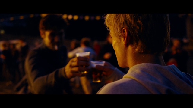 Video Reference: Tableware, Flash photography, Gesture, Entertainment, Drink, Alcoholic beverage, T-shirt, Event, Alcohol, Fun