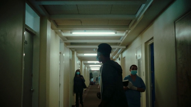 Video Reference: Standing, Ceiling, Event, T-shirt, Darkness, Fun, Luggage and bags, Flooring, City, Room