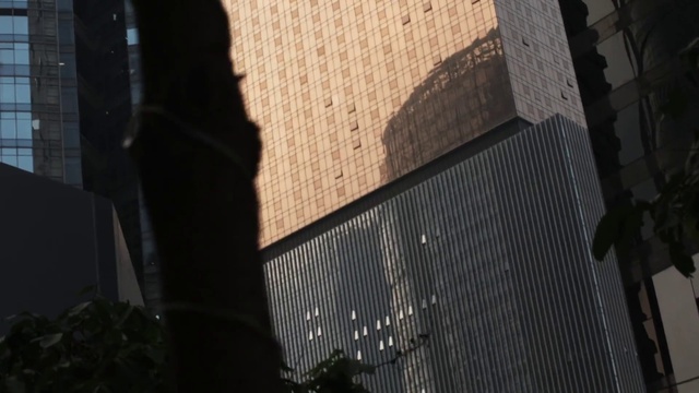 Video Reference: Water, Building, Tower block, Tints and shades, Facade, City, Condominium, Urban design, Shade, Glass