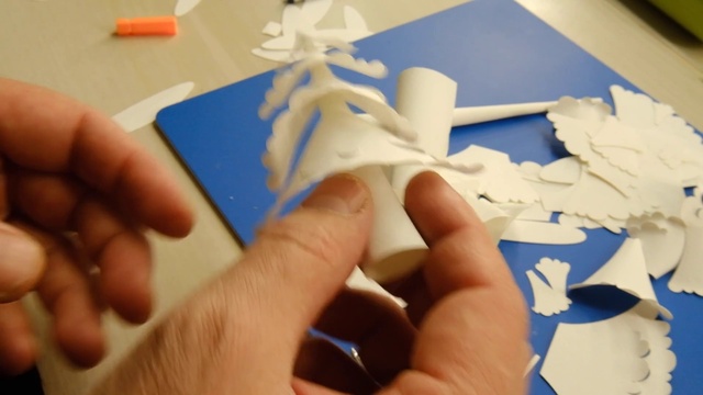 Video Reference: Hand, Finger, Gesture, Creative arts, Thumb, Nail, Art, Material property, Wood, Pattern