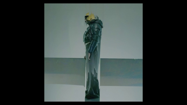 Video Reference: Sleeve, Art, Sculpture, Font, Statue, Rectangle, Fashion design, Display device, Glass, Visual arts