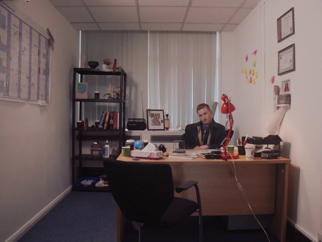 Video Reference: Furniture, Building, Table, Picture frame, Desk, Interior design, Chair, Computer desk, Wall, Office chair