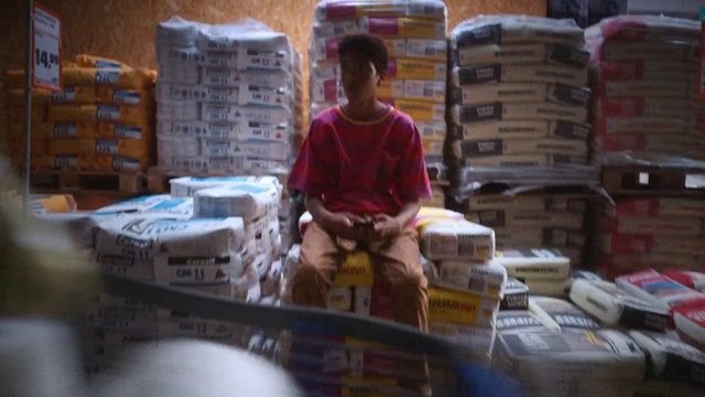 Video Reference: Selling, Wood, Plastic, Publication, Retail, Box, Travel, City, T-shirt, Sitting