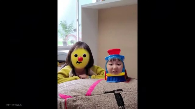 Video Reference: Eyelash, Doll, Toy, Headgear, Stuffed toy, Art, Happy, Plush, Shelf, Fun