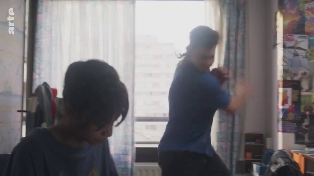 Video Reference: Standing, Shelf, T-shirt, Bookcase, Fun, Curtain, Event, Shelving, Window, Conversation