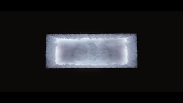 Video Reference: Rectangle, Sky, Tints and shades, Font, Electric blue, Darkness, Picture frame, Display device, Grass, Monochrome photography