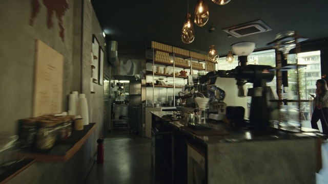 Video Reference: Building, Barware, Kitchen, Drinking establishment, Machine, Room, Kitchen appliance, Darkness, Light fixture, Wood