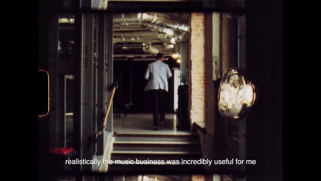 Video Reference: Fixture, Flash photography, Sleeve, Tints and shades, Darkness, Street fashion, Event, Room, Symmetry, Stairs