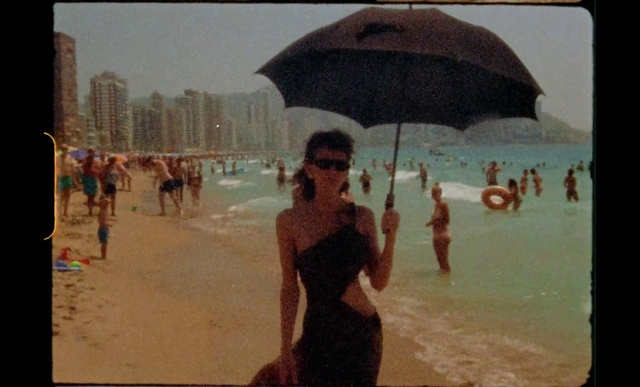 Video Reference: Water, Sky, Photograph, Umbrella, People on beach, Travel, Beach, Leisure, Fun, Swimwear