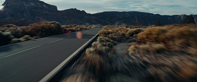 Video Reference: Sky, Cloud, Mountain, Plant, Natural landscape, Tree, Road surface, Wood, Asphalt, Slope