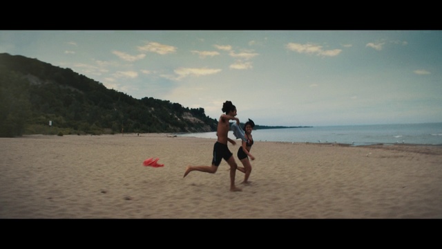 Video Reference: Cloud, Sky, Shorts, Water, People on beach, Leg, People in nature, Trunks, Beach, Coastal and oceanic landforms