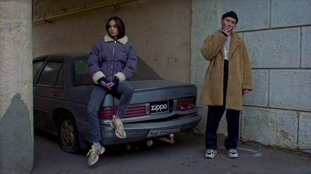 Video Reference: Vehicle registration plate, Land vehicle, Vehicle, Car, Automotive tail & brake light, Wheel, Tire, Motor vehicle, Automotive lighting, Automotive design