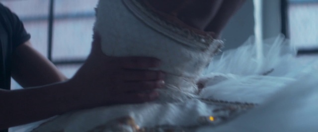 Video Reference: Sleeve, Mammal, Gesture, Human leg, Elbow, Electric blue, Chest, Knee, Windshield, Vehicle door