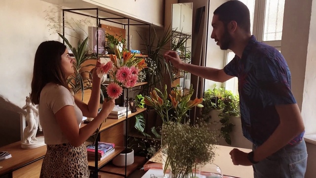 Video Reference: Flower, Plant, Arm, Shoulder, Flowerpot, Houseplant, Window, Creative arts, Flower Arranging, T-shirt