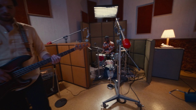 Video Reference: Microphone, Musical instrument, Guitar, Musician, Audio equipment, Electronic instrument, Microphone stand, Musical instrument accessory, Music, Lamp