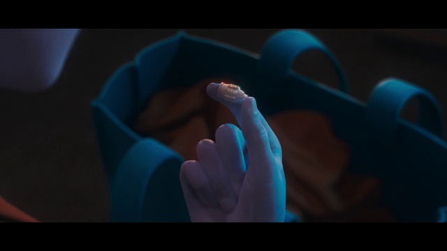 Video Reference: Azure, Gesture, Finger, Musical instrument, Thumb, Wrist, Nail, Electric blue, Steering wheel, Toy