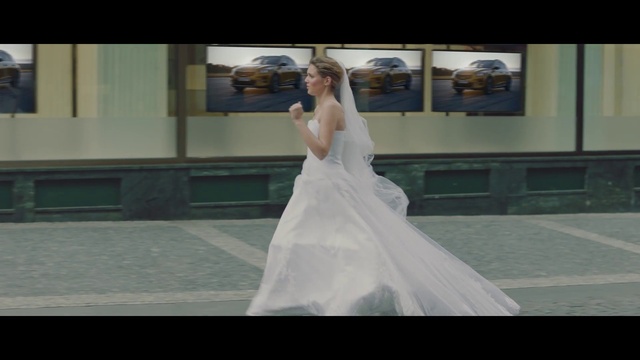 Video Reference: Wedding dress, Bride, Shoulder, Bridal clothing, Bridal party dress, Flash photography, Waist, Dress, Bridal veil, Happy